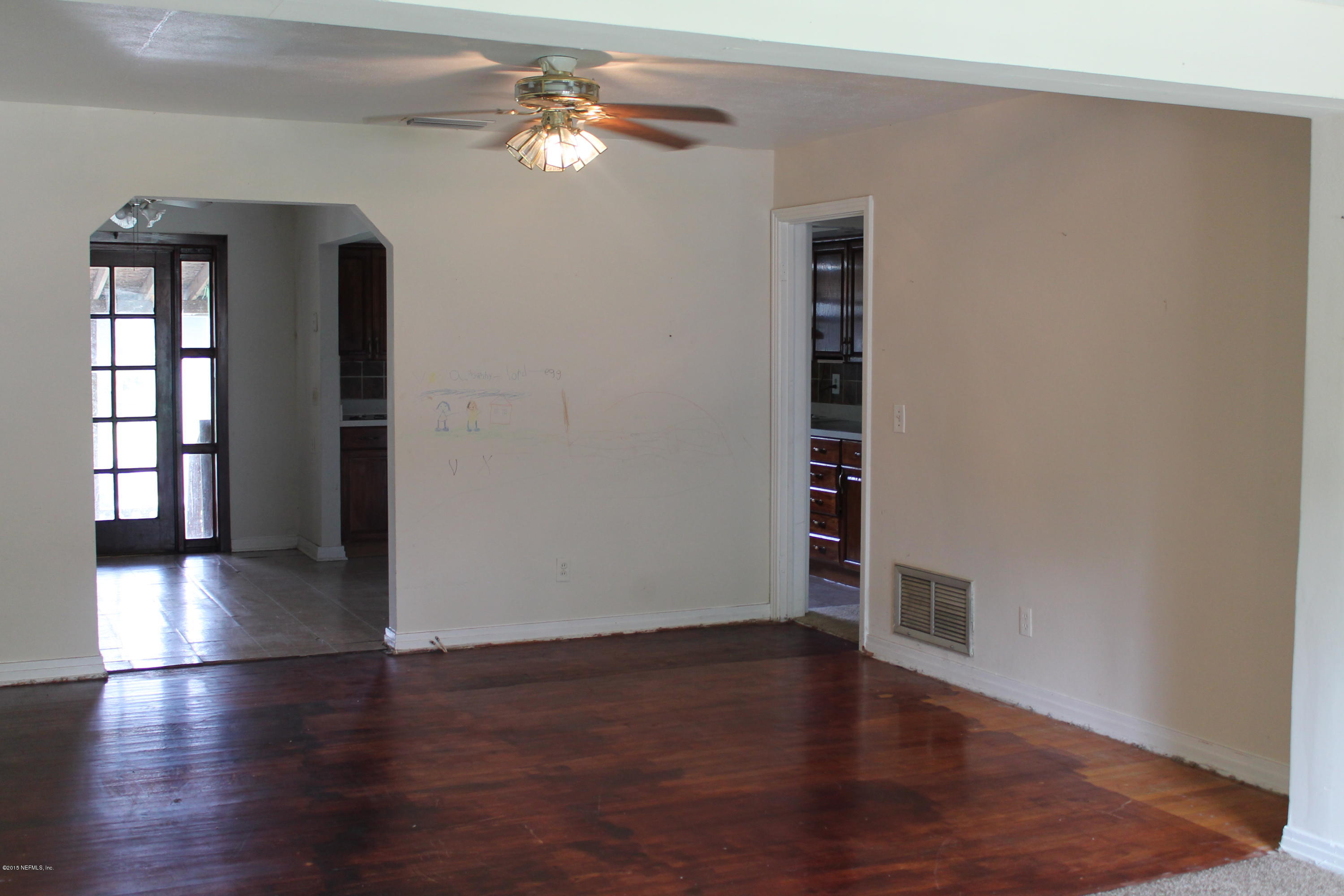 2712 Lorna Road Jacksonville, FL 32211 - Photo 5 of 30 wooden floor in an empty room with a window