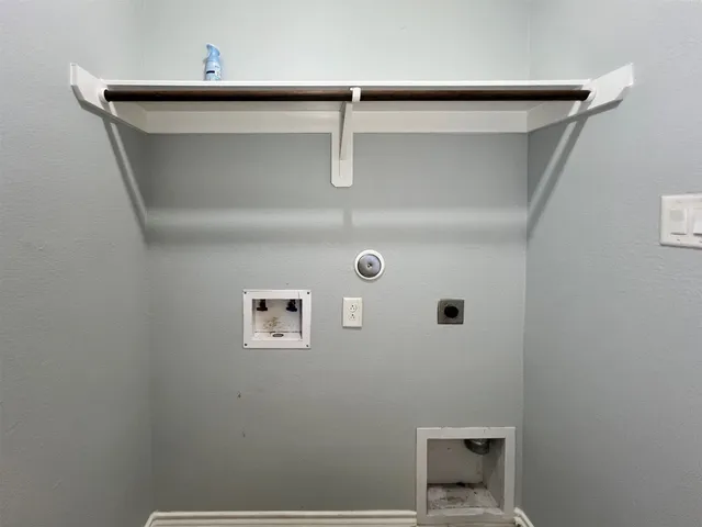 wooden floor in a hall with a bathroom