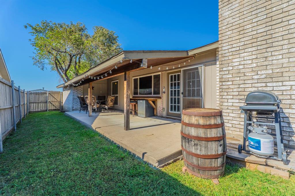 5109 Reed Drive The Colony, TX 75056 - Photo 14 of 14 a view of a house with backyard porch and sitting area