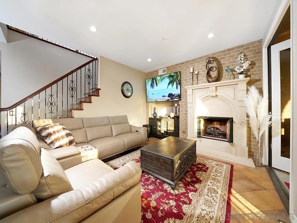 33 Tuscany Ladera Ranch, CA 92694 - Photo 13 of 50 a living room with furniture or couch and a fireplace