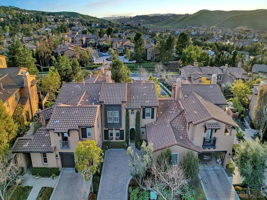 33 Tuscany Ladera Ranch, CA 92694 - Photo 25 of 50 an aerial view of multiple houses with a yard