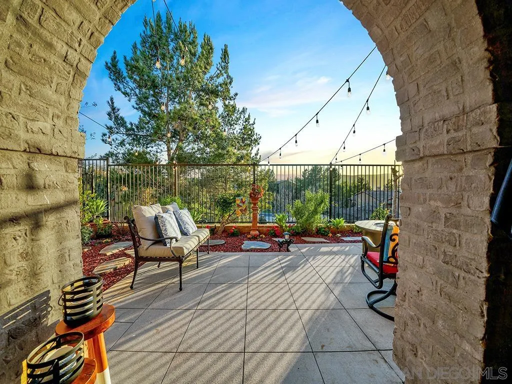 33 Tuscany Ladera Ranch, CA 92694 - Photo 30 of 50 a balcony with couch and wooden floor
