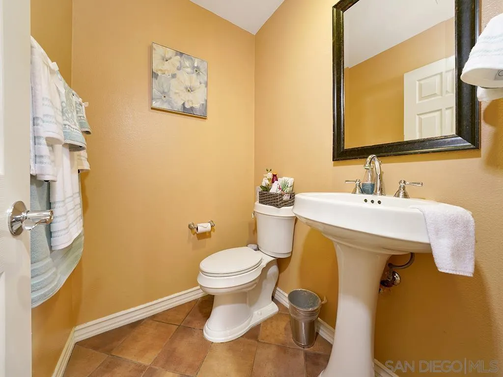 33 Tuscany Ladera Ranch, CA 92694 - Photo 34 of 50 a bathroom with a sink and a toilet