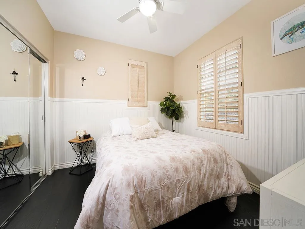 33 Tuscany Ladera Ranch, CA 92694 - Photo 38 of 50 a bedroom with a bed and a chandelier