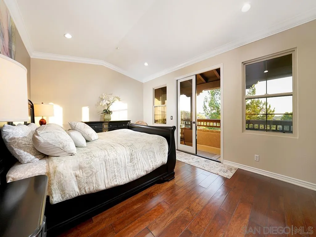 33 Tuscany Ladera Ranch, CA 92694 - Photo 39 of 50 a bedroom with a large bed and a window