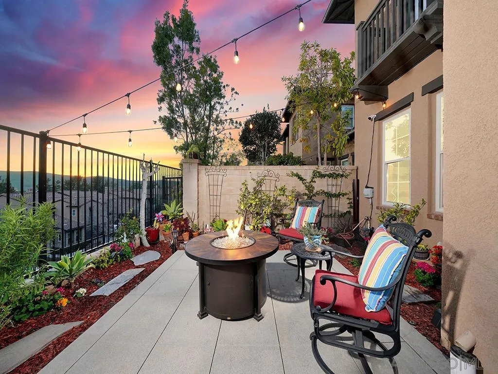 33 Tuscany Ladera Ranch, CA 92694 - Photo 50 of 50 a view of a patio with a dining table and chairs with potted plants