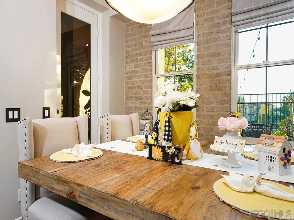 33 Tuscany Ladera Ranch, CA 92694 - Photo 9 of 50 a view of a dining room with furniture and a window
