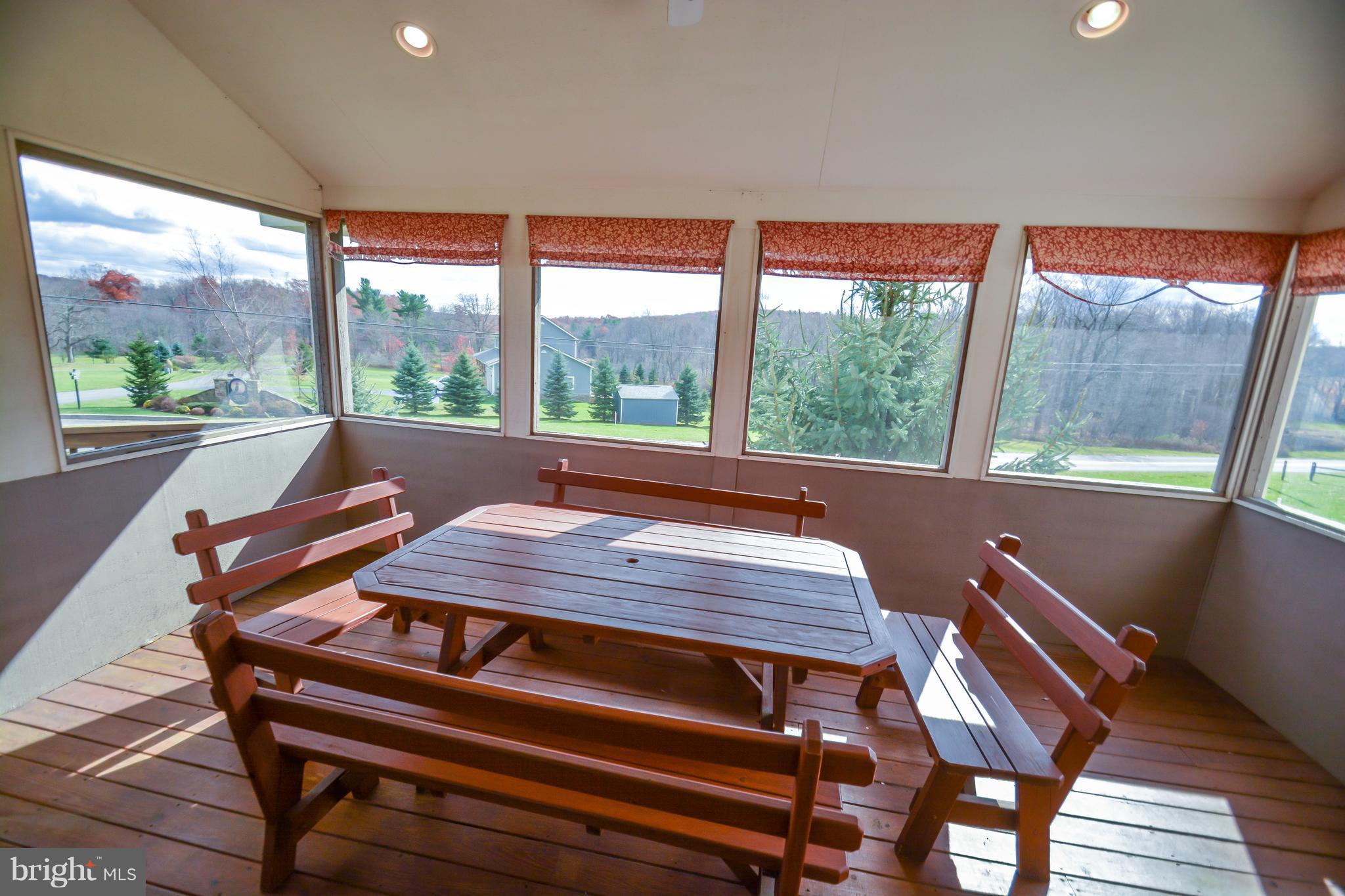 1015 Paradise Point Road Oakland, MD 21550 - Photo 3 of 29 Screened Porch