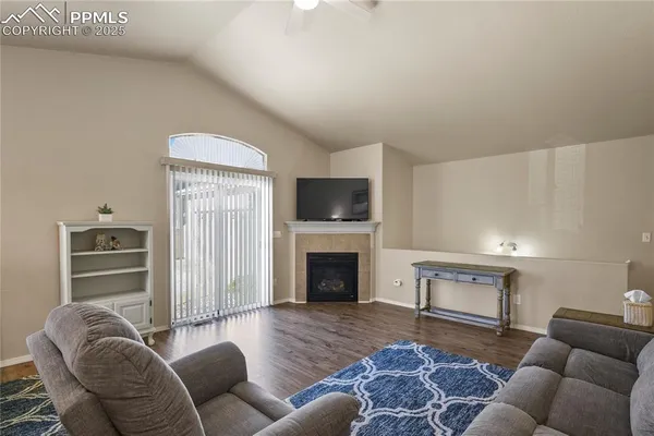 a living room with furniture or fireplace and a flat screen tv