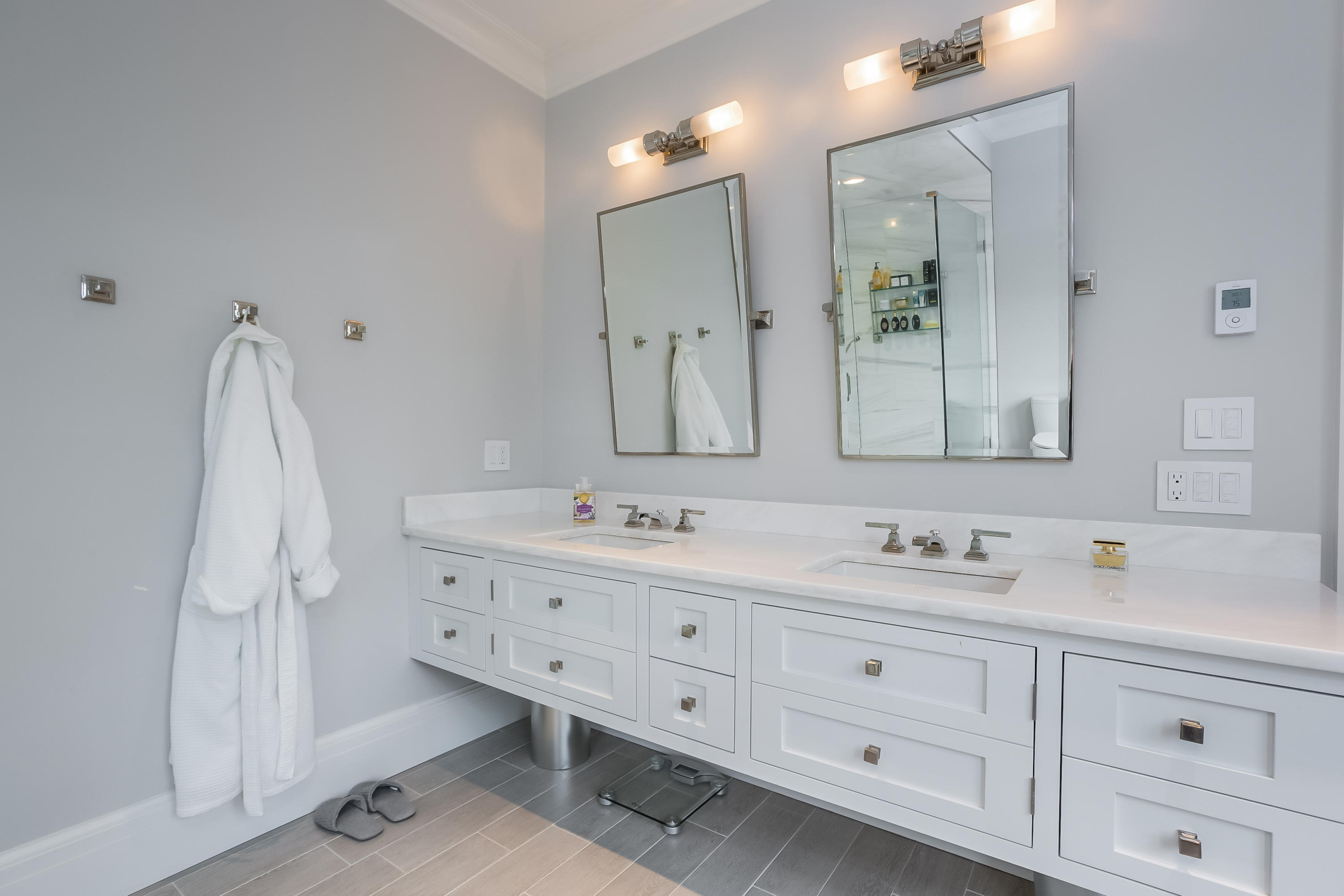 86 Roton Avenue Rowayton, CT 06853 - Photo 19 of 35 a bathroom with a double vanity sink mirror and