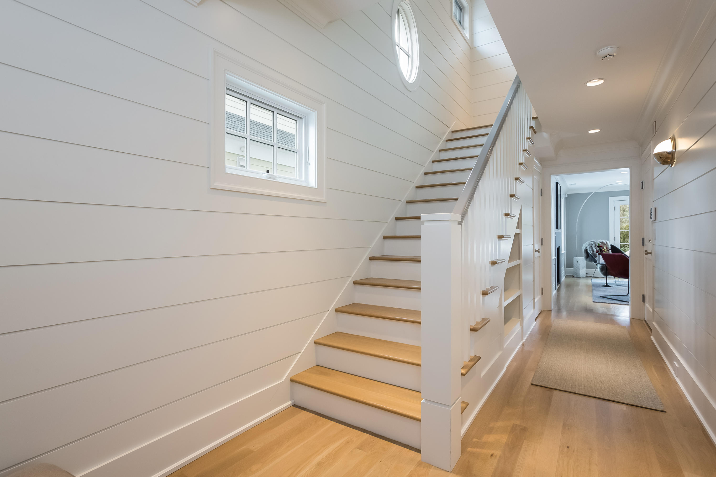 86 Roton Avenue Rowayton, CT 06853 - Photo 9 of 35 a view of entryway with stairs and wooden floor