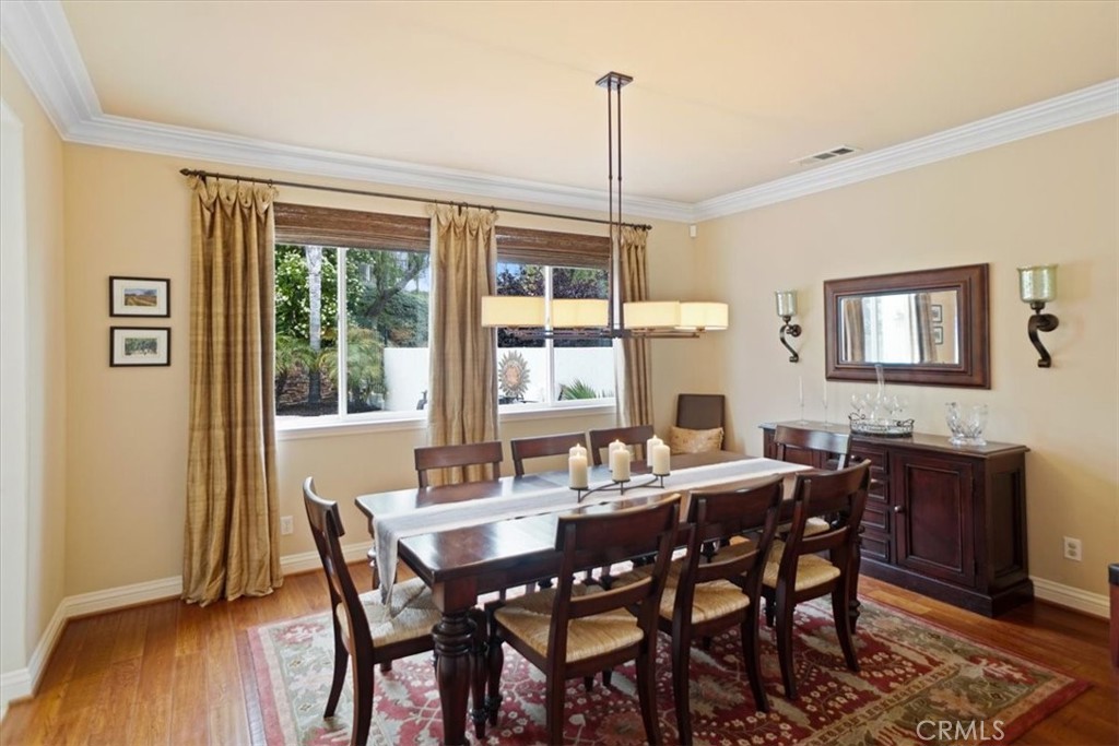 26511 Brooks Circle Stevenson Ranch, CA 91381 - Photo 11 of 55 a view of a dining room with furniture window and wooden floor