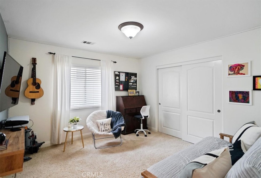 26511 Brooks Circle Stevenson Ranch, CA 91381 - Photo 34 of 55 a view of a livingroom with workspace and a window