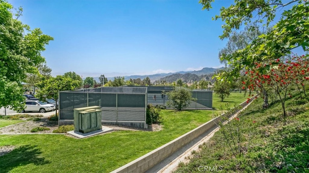 26511 Brooks Circle Stevenson Ranch, CA 91381 - Photo 50 of 55 a view of a garden with a sitting area