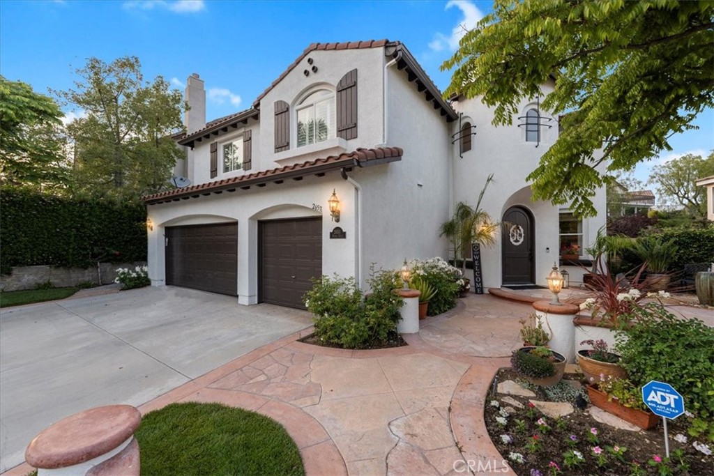 26511 Brooks Circle Stevenson Ranch, CA 91381 - Photo 53 of 55 a front view of a house with garden