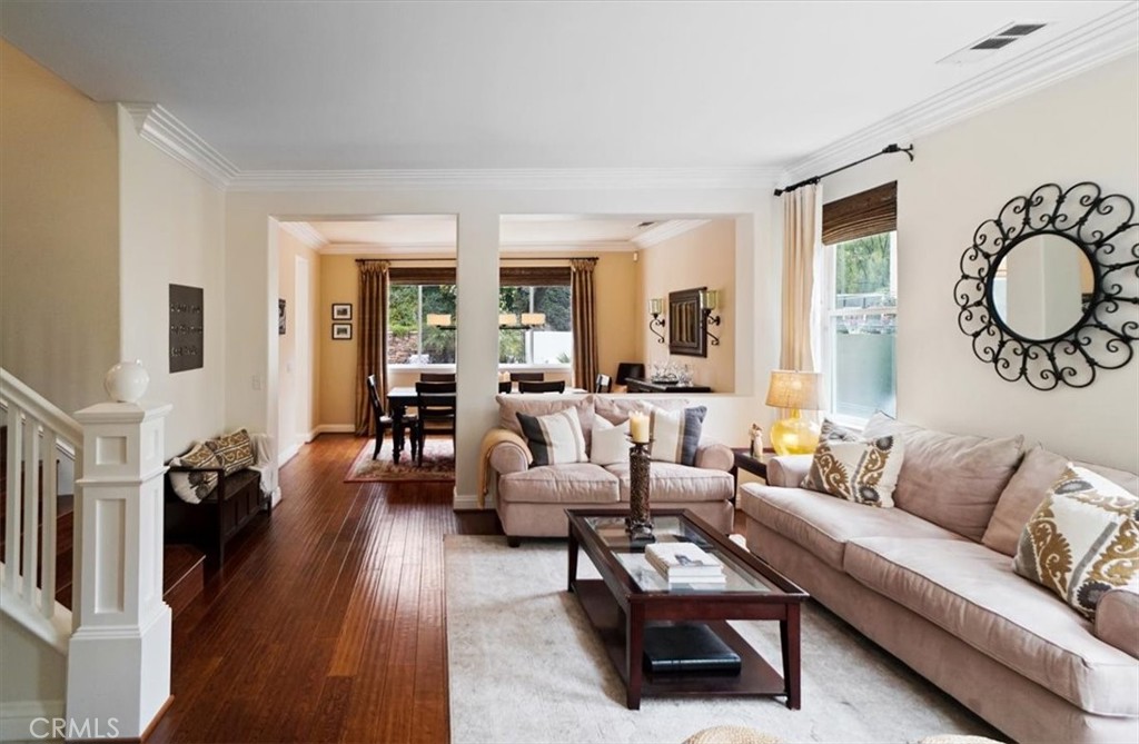 26511 Brooks Circle Stevenson Ranch, CA 91381 - Photo 6 of 55 a living room with furniture and a large window