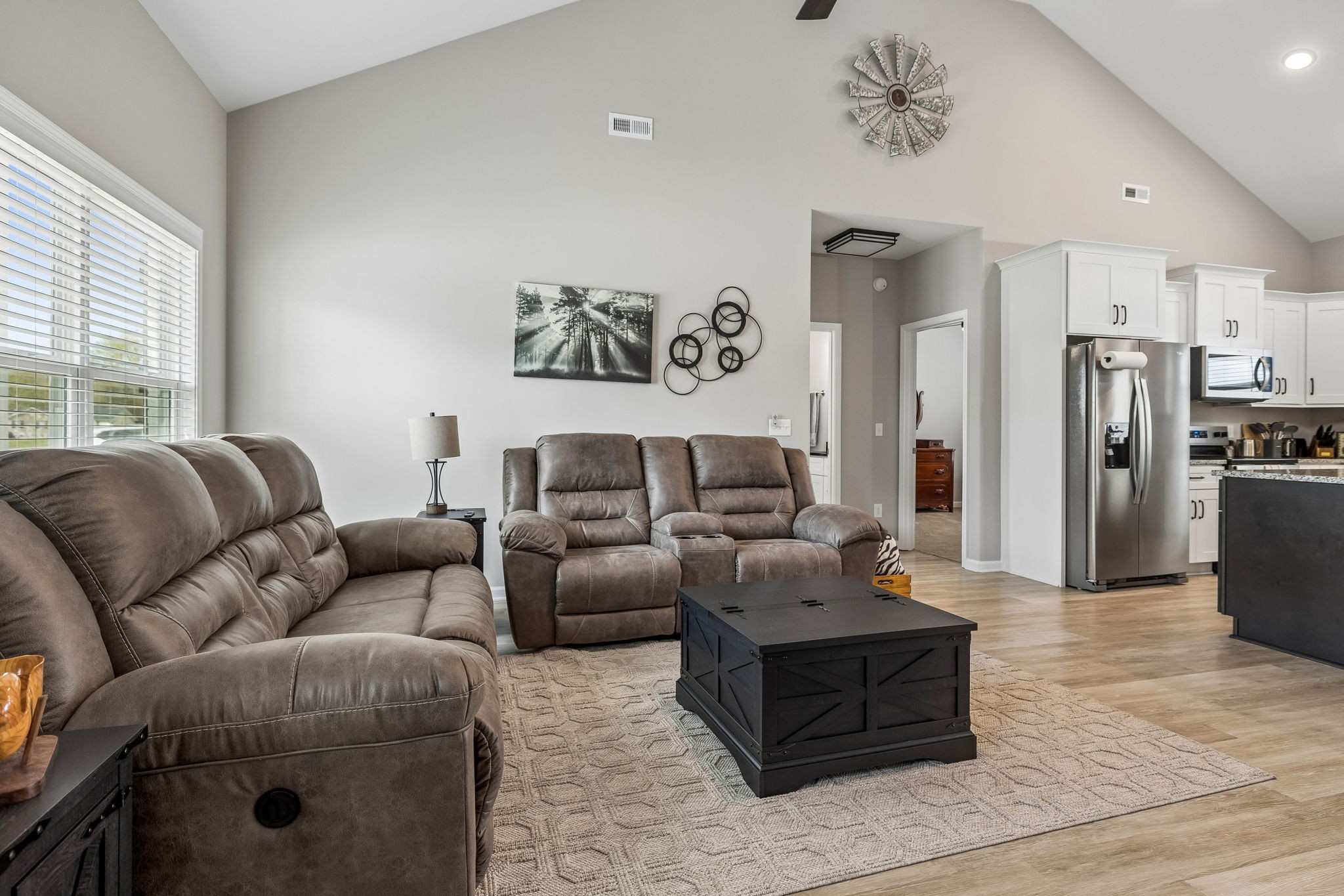 180 Vickers Hill Road Smithville, TN 37166 - Photo 7 of 33 a living room with furniture and a refrigerator
