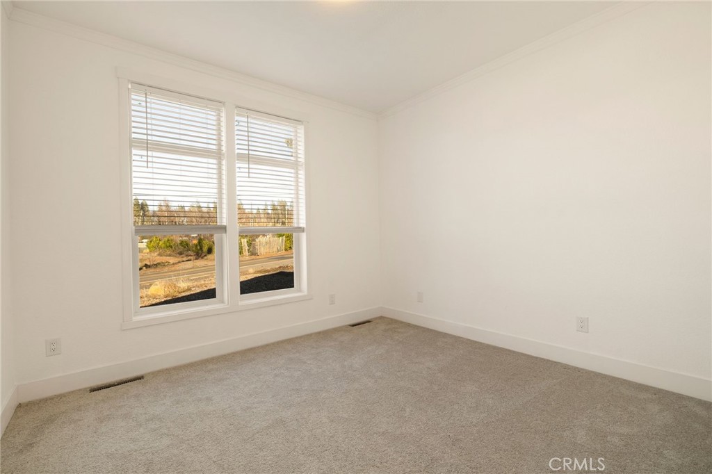926 Bille Road Paradise, CA 95969 - Photo 13 of 28 an empty room with a window