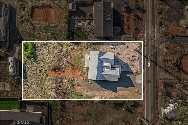 an aerial view of residential building with parking space