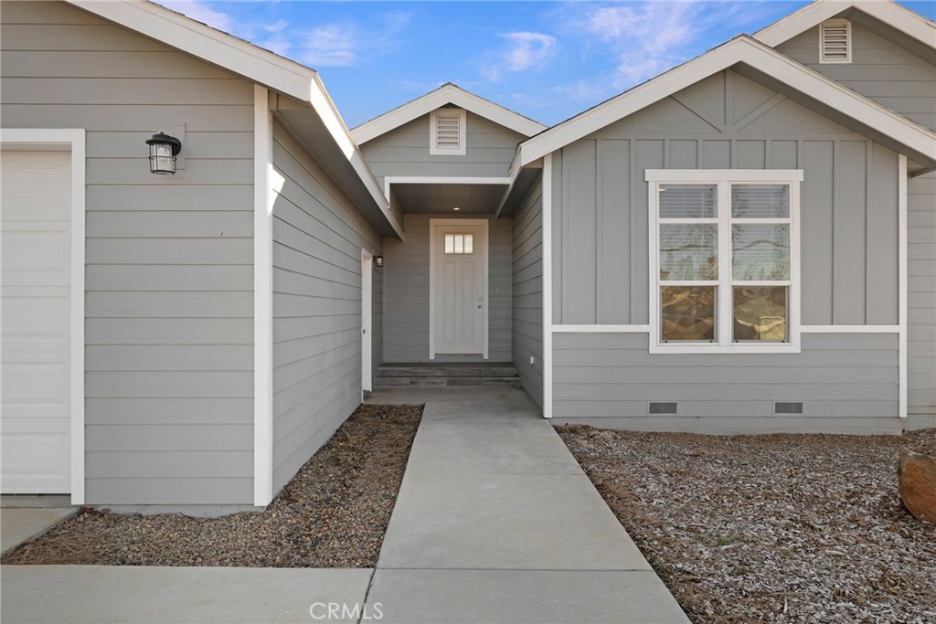 926 Bille Road Paradise, CA 95969 - Photo 3 of 28 a view of a house with a door and a window