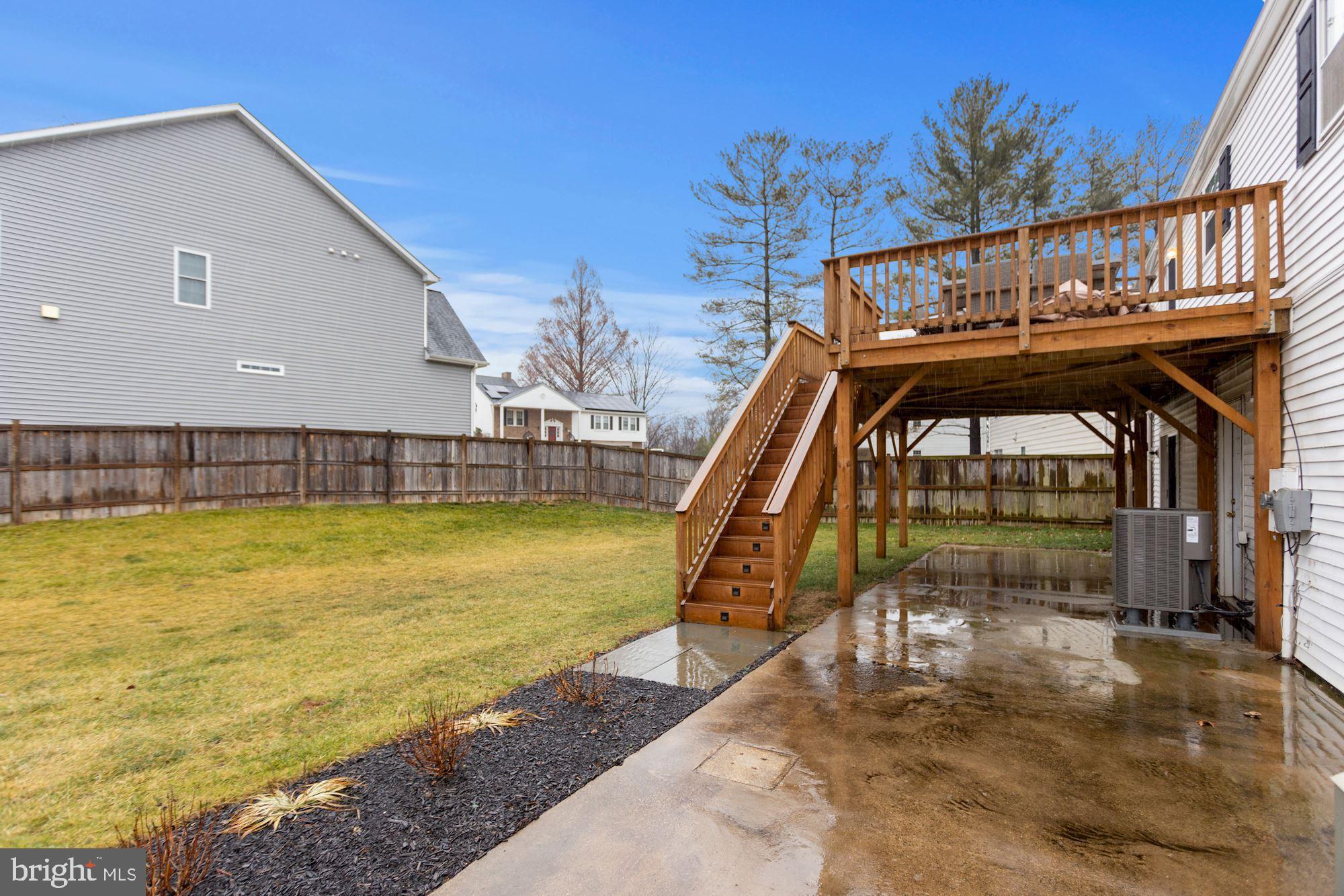 9538 Burning Branch Road Burke, VA 22015 - Photo 28 of 33 Access to Large Fenced Lot from Deck and Patio