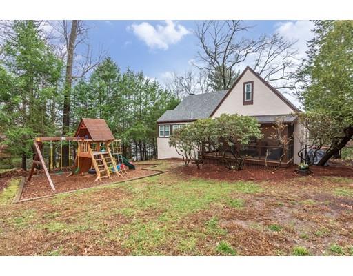 42 Gayland Road Needham, MA 02492 - Photo 20 of 22 a backyard of a house with table and chairs