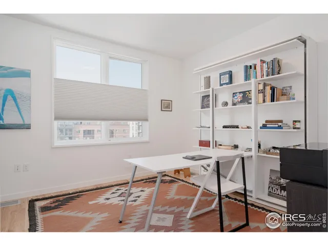 a view of a workspace with furniture