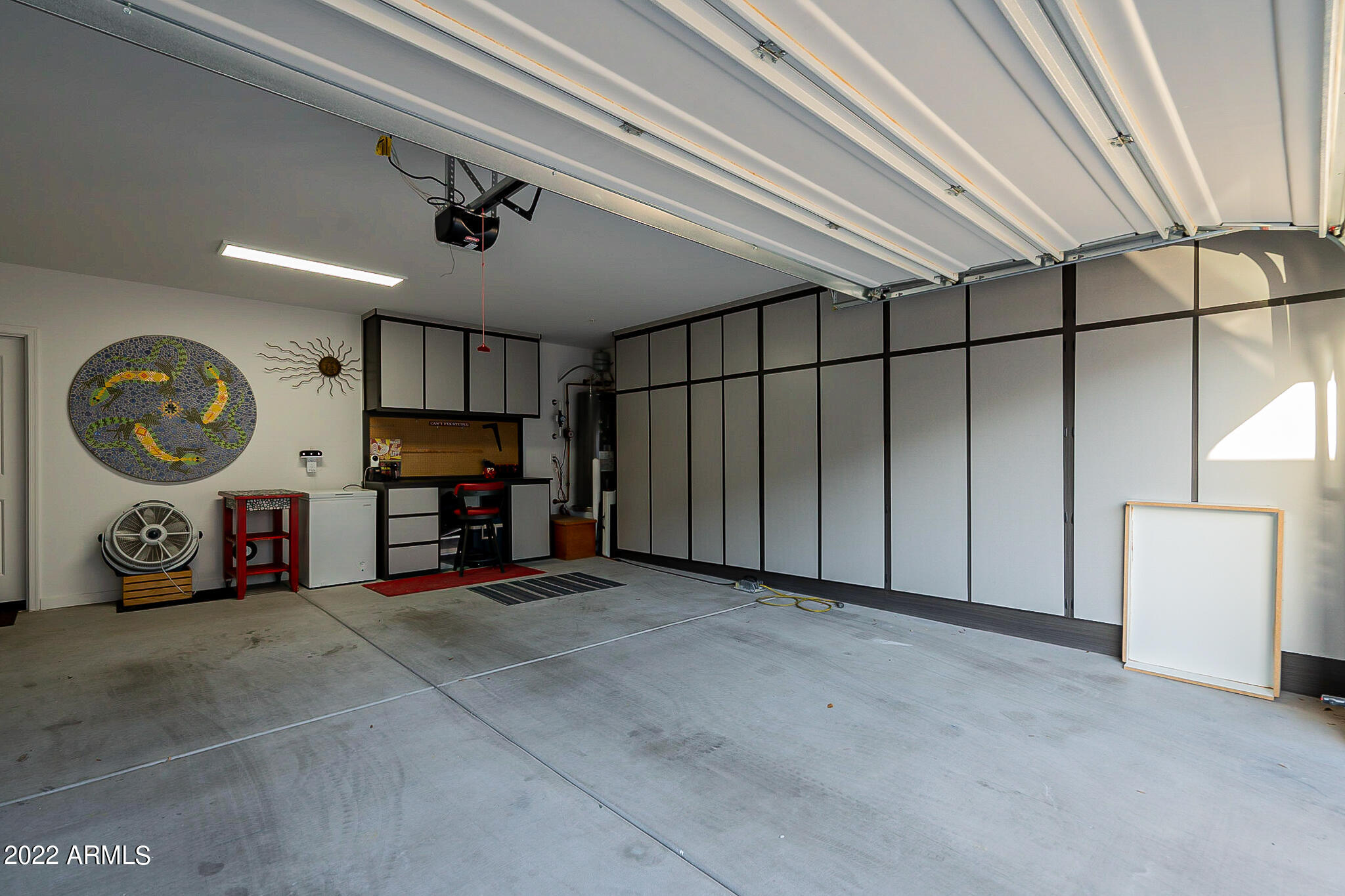 3900 East Baseline Road, Unit 142 Phoenix, AZ 85042 - Photo 27 of 28 a view of a livingroom with a tv