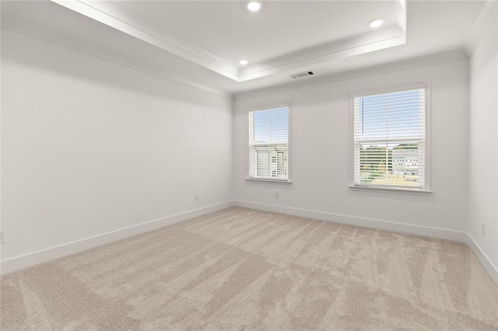 104 Agnew Way Woodstock, GA 30188 - Photo 20 of 47 an empty room with windows
