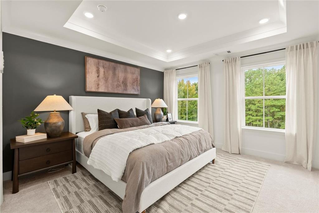 104 Agnew Way Woodstock, GA 30188 - Photo 21 of 47 a bedroom with bed and a large window