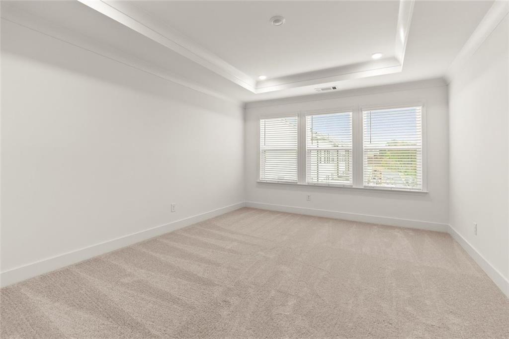 104 Agnew Way Woodstock, GA 30188 - Photo 23 of 47 an empty room with windows