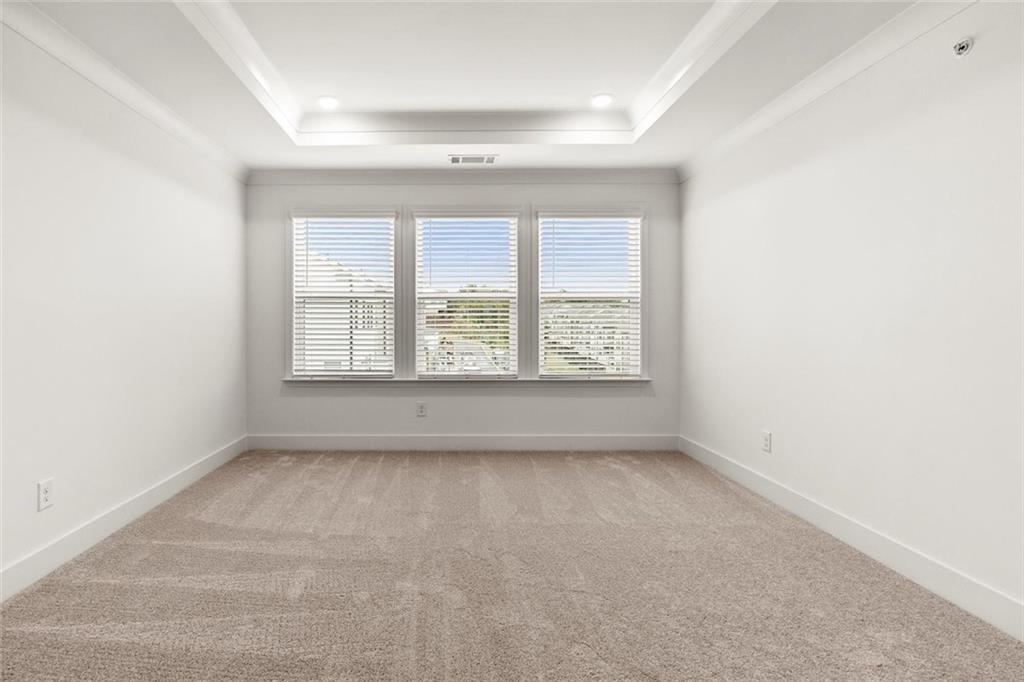 104 Agnew Way Woodstock, GA 30188 - Photo 25 of 47 an empty room with a window