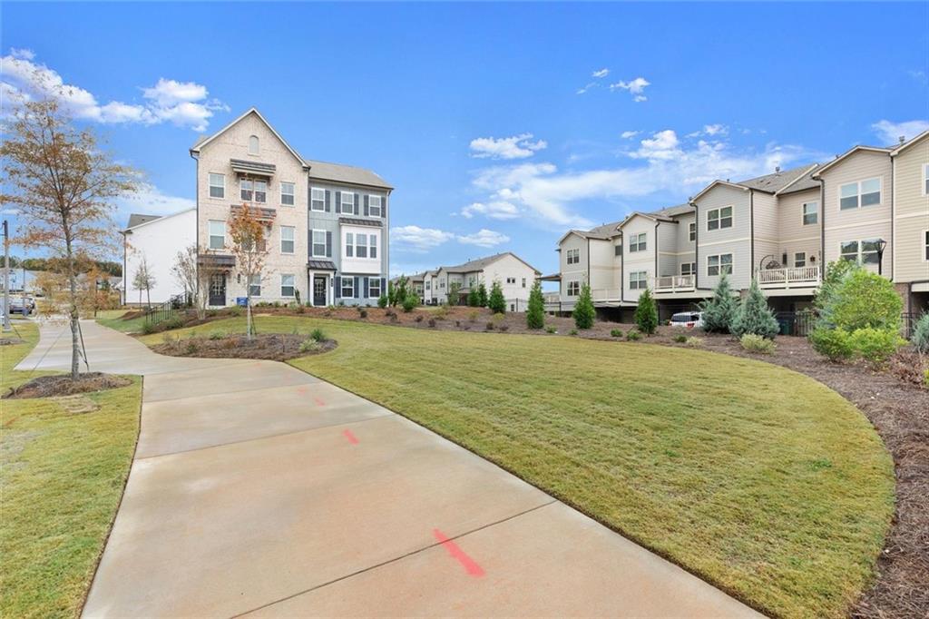 104 Agnew Way Woodstock, GA 30188 - Photo 34 of 47 a view of residential houses with city view