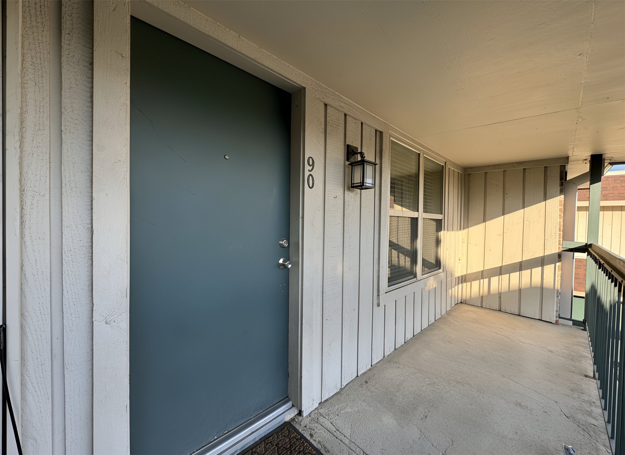a view of staircase with rug