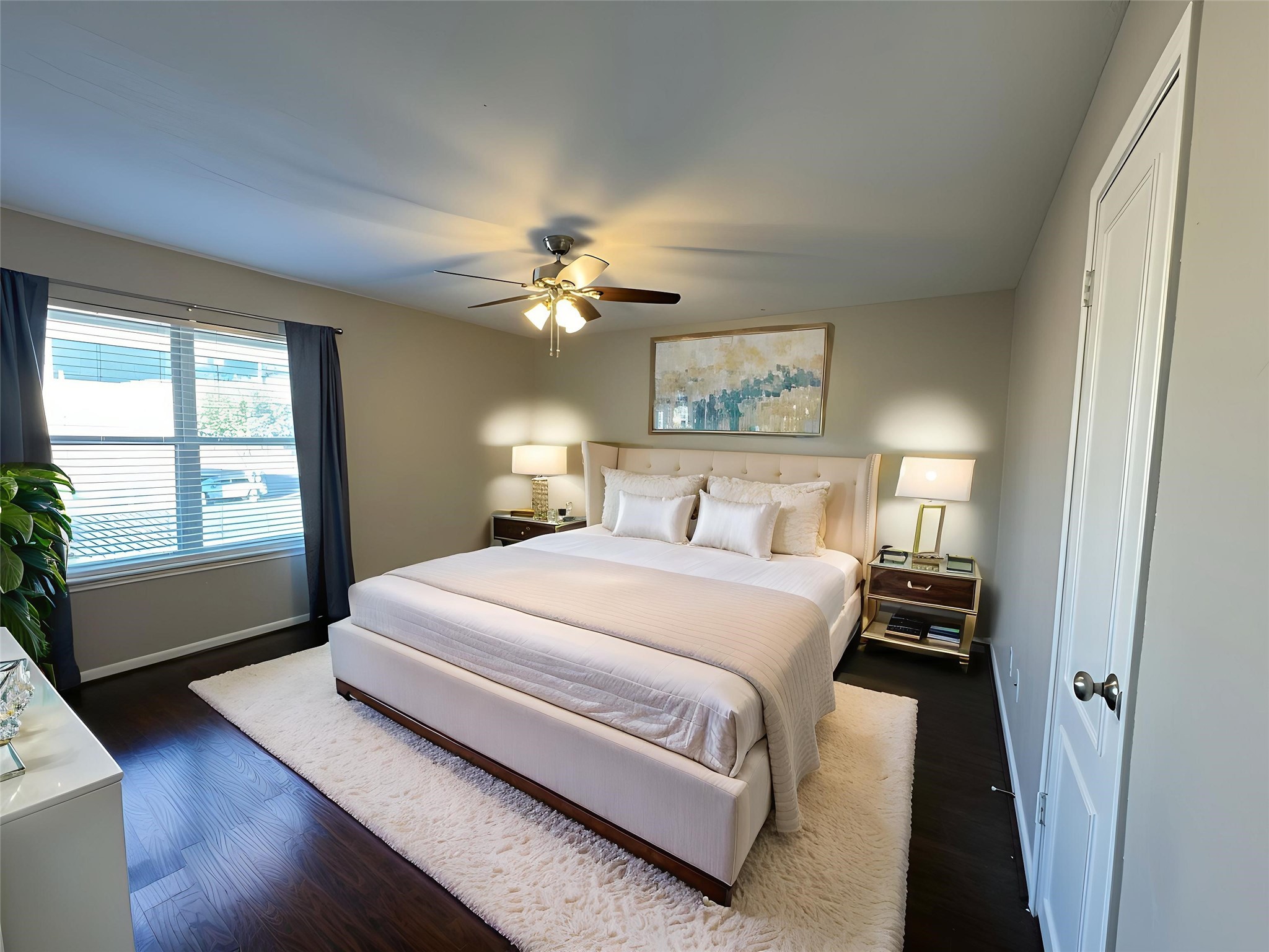 845 Augusta Drive, Unit 90 Houston, TX 77057 - Photo 15 of 17 a bedroom with a bed and a chandelier