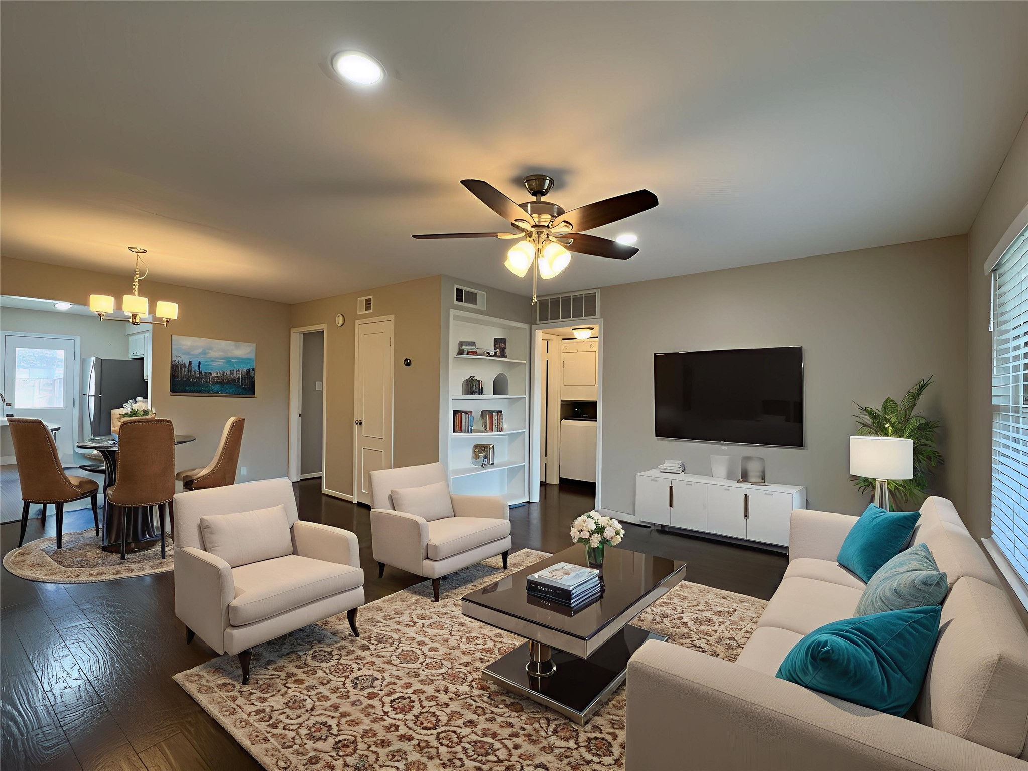 845 Augusta Drive, Unit 90 Houston, TX 77057 - Photo 4 of 17 a living room with furniture a rug and a flat screen tv