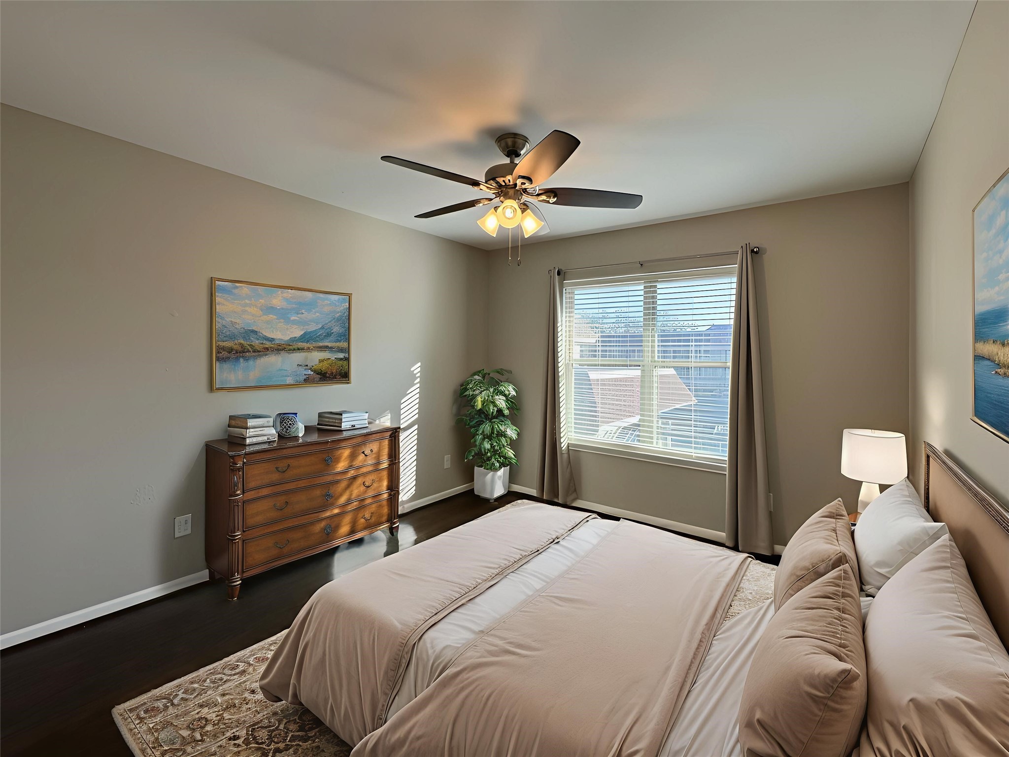 845 Augusta Drive, Unit 90 Houston, TX 77057 - Photo 10 of 17 a bedroom with a bed dresser and a window