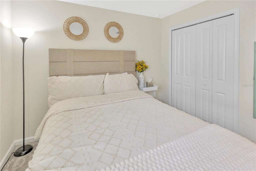 530 Patton Loop Bartow, FL 33830 - Photo 21 of 38 a bedroom with a bed and painting on the wall