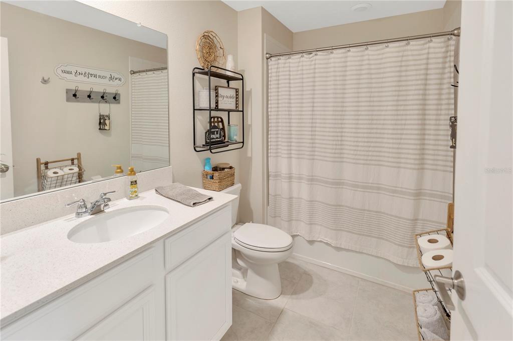 530 Patton Loop Bartow, FL 33830 - Photo 25 of 38 a bathroom with a sink toilet and shower