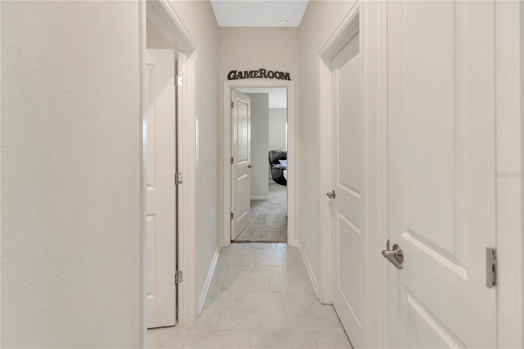 530 Patton Loop Bartow, FL 33830 - Photo 26 of 38 a view of a hallway with wooden floor