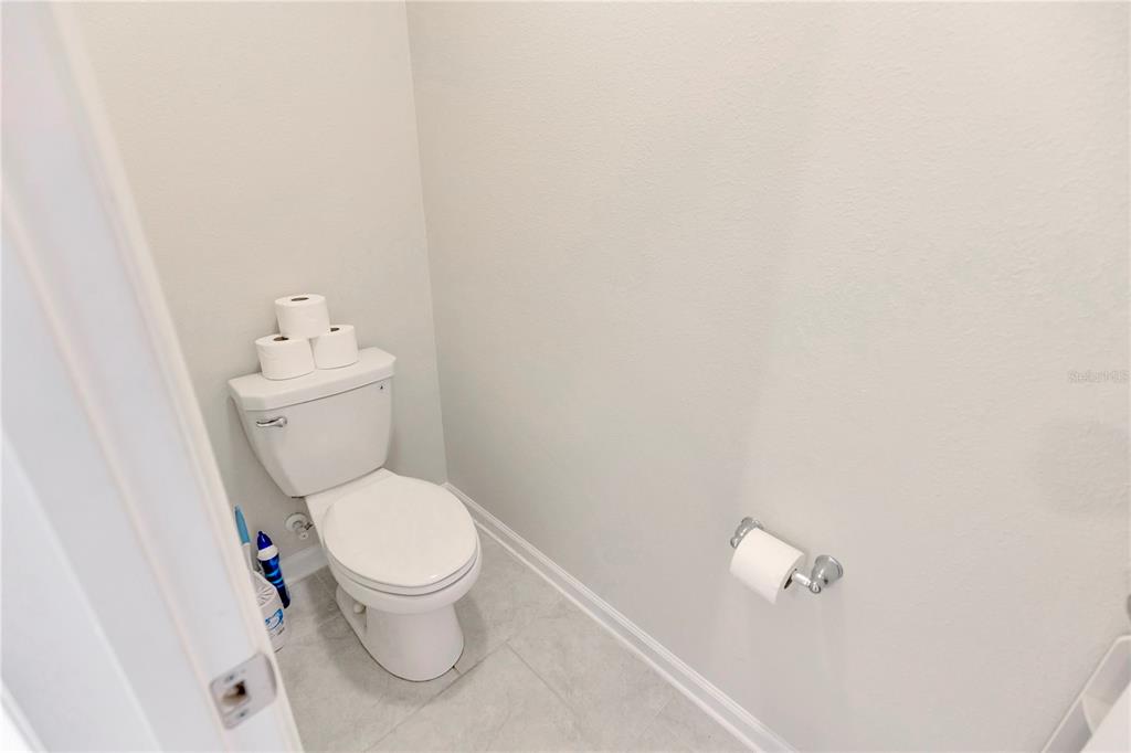 530 Patton Loop Bartow, FL 33830 - Photo 33 of 38 a white toilet sitting next to a white cabinet
