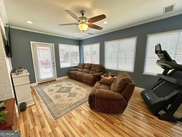 a living room with furniture and a window
