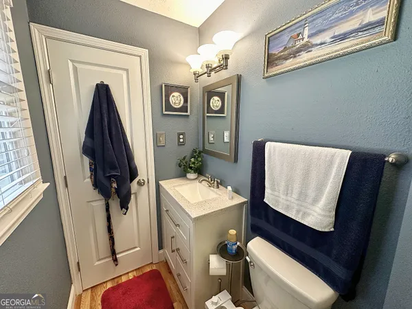 a view of living room with furniture and a window