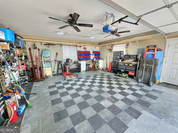 a wooden bench sitting in front of a building