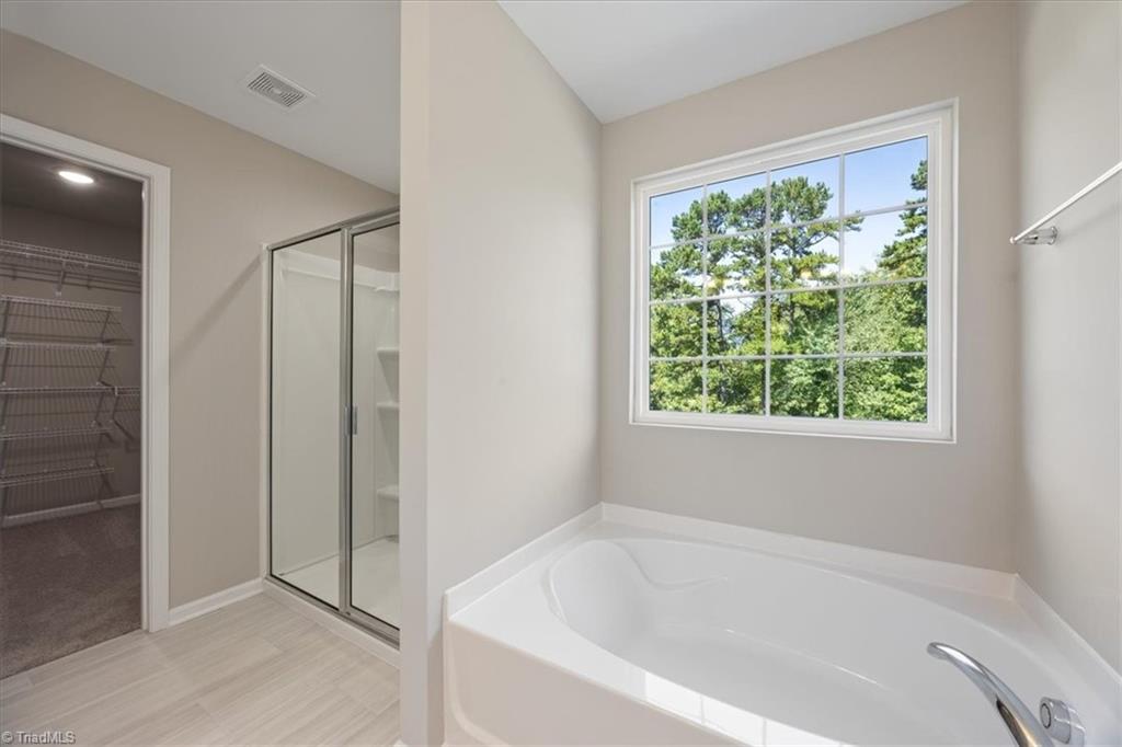 3199 Riley Ford Trail High Point, NC 27265 - Photo 21 of 33 primary bath tub & shower