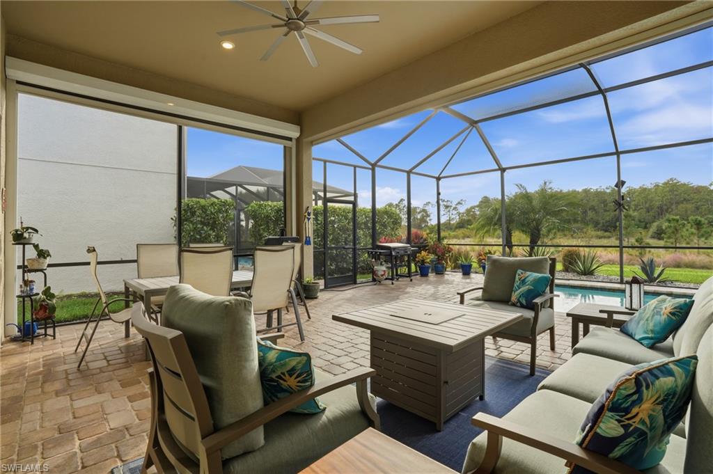 17210 Ashcomb Way Estero, FL 33928 - Photo 36 of 47 a view of a dining room with furniture window and outside view