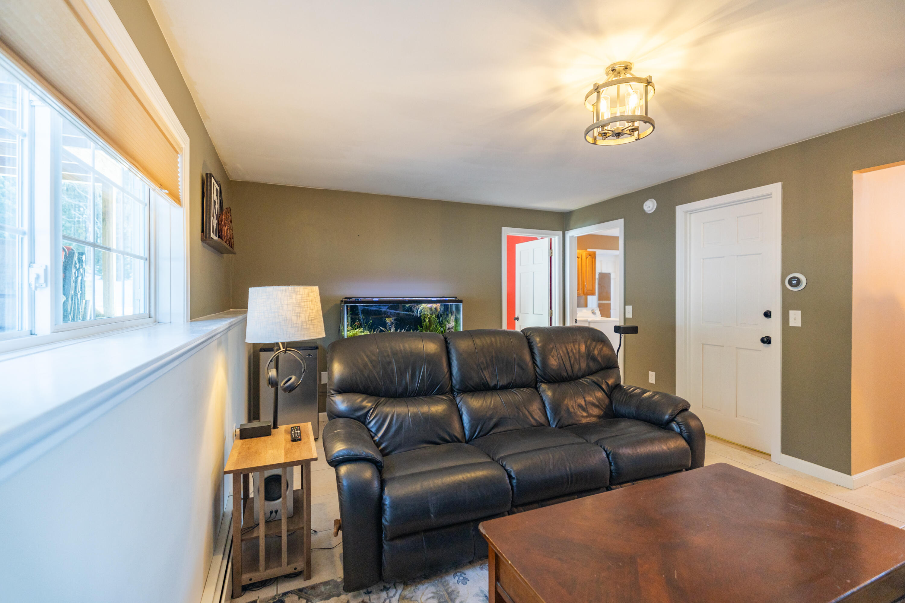1335 Lewiston Road New Gloucester, ME 04260 - Photo 29 of 39 family room down 3