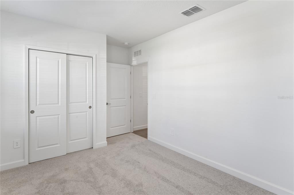 6692 Homebound Way New Port Richey, FL 34653 - Photo 30 of 47 a view of an empty room