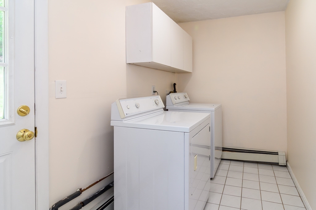 33 Eisenhower Road Framingham, MA 01701 - Photo 11 of 20 a utility room with dryer and washer