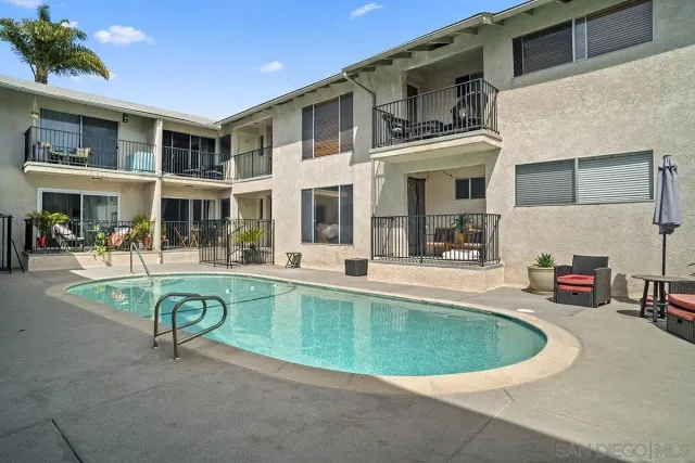 a view of a building with a swimming pool